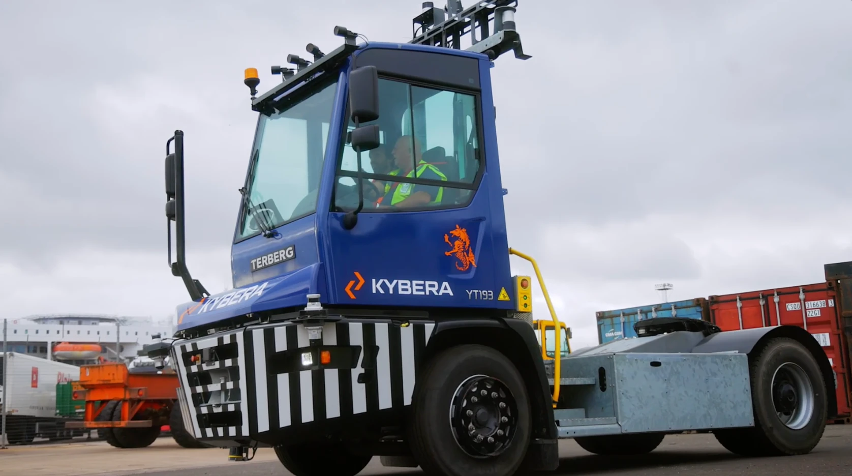 Terminal tractor retrofitted with autonomous vehicle kit
